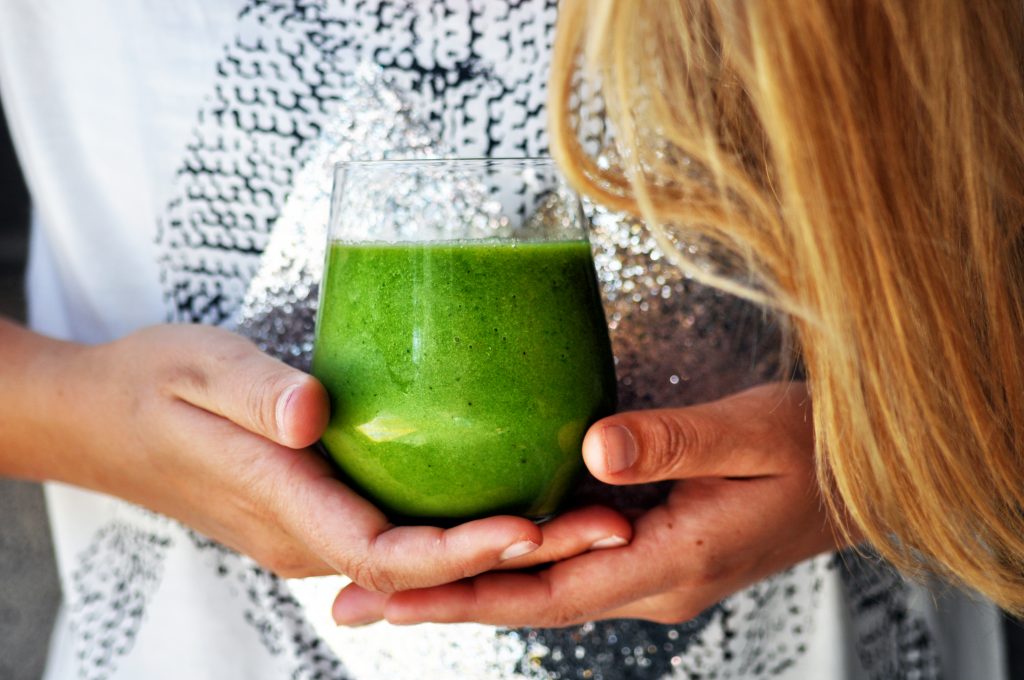 About-Life-Women-Hands-Holding-Green-Smoothie-1024x680