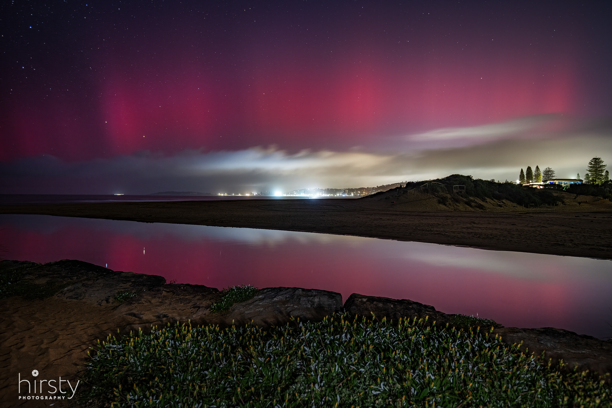 Local Photographer Captures Rare Aurora Lights Over Narrabeen
